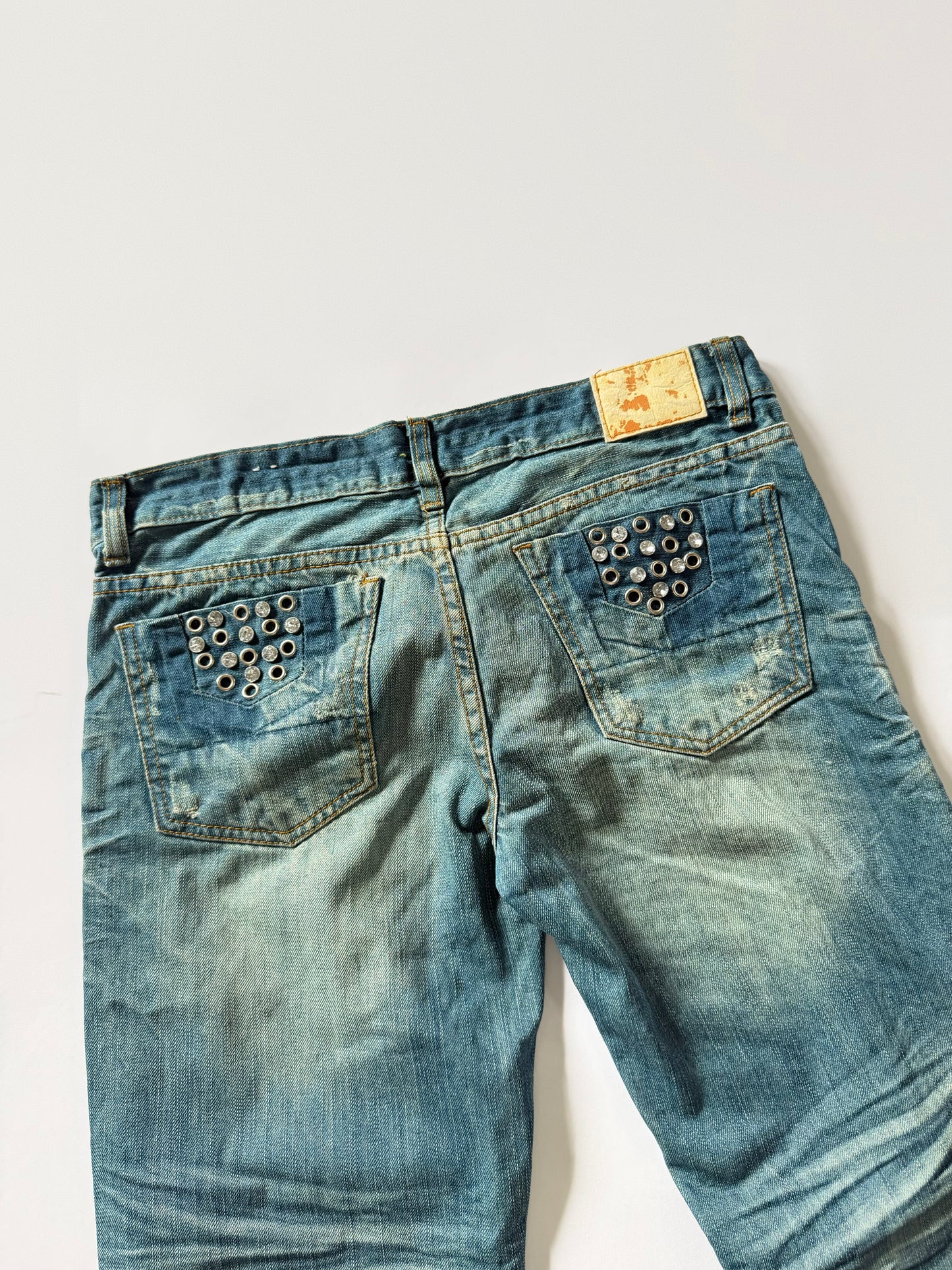 Eyelet work wash Jeans